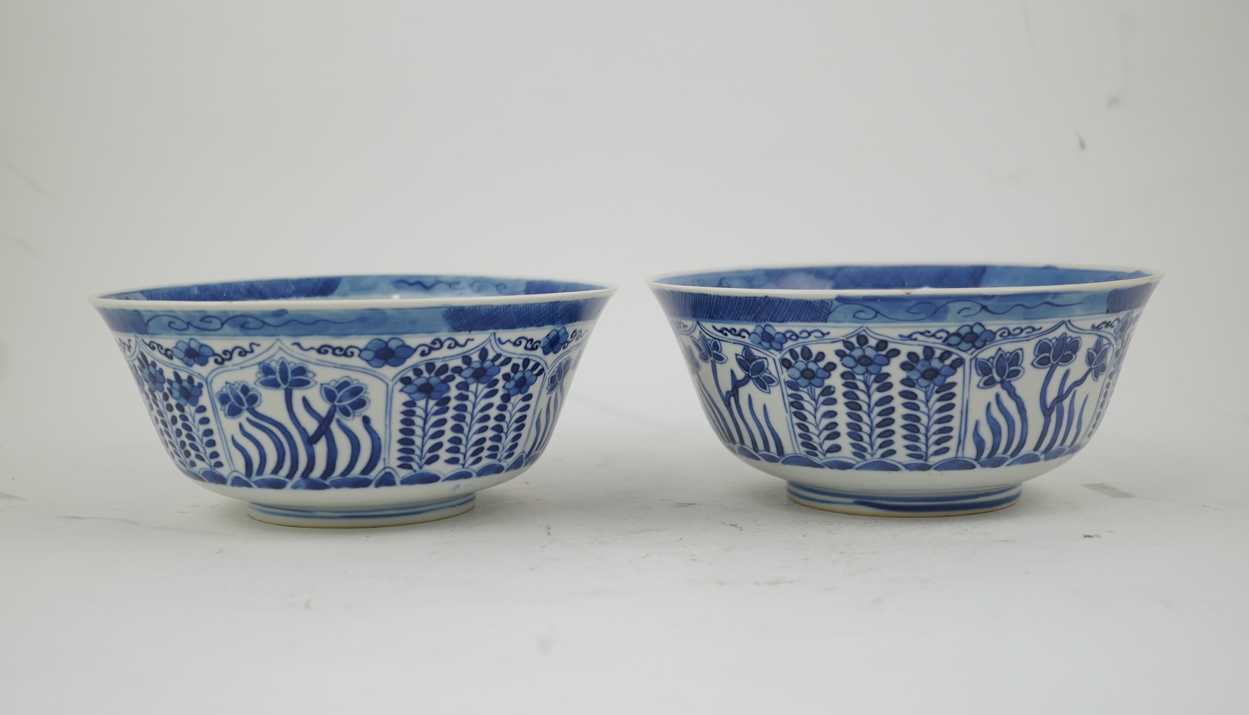 A pair of Chinese blue and white bowls, Kangxi four character mark, 19th century